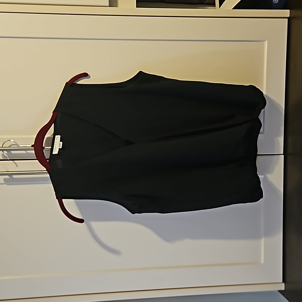 Freda's black crossover blouse with elastic waist